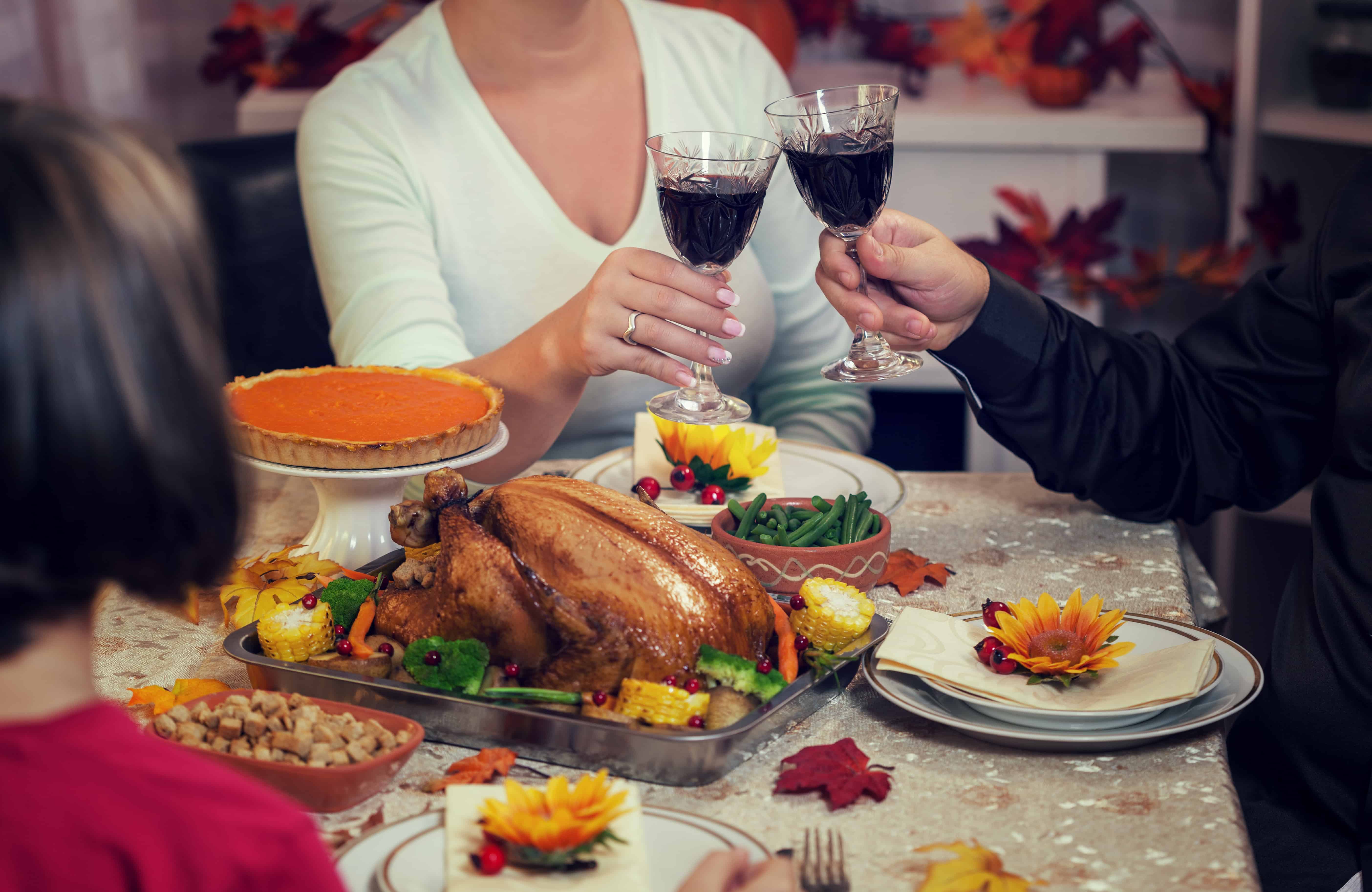 A family celebrating Thanksgiving together NK&A Marketing
